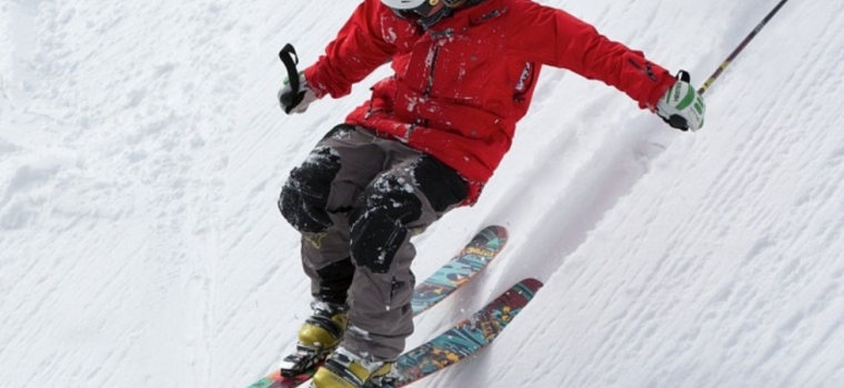 Downhill Skiier in Red Parka